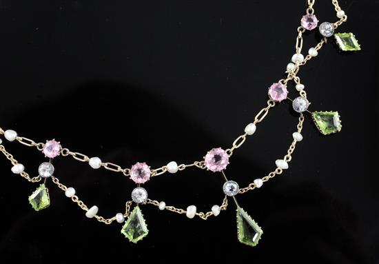 An Edwardian 15ct gold and multi gem set fringe necklace, 42cm.